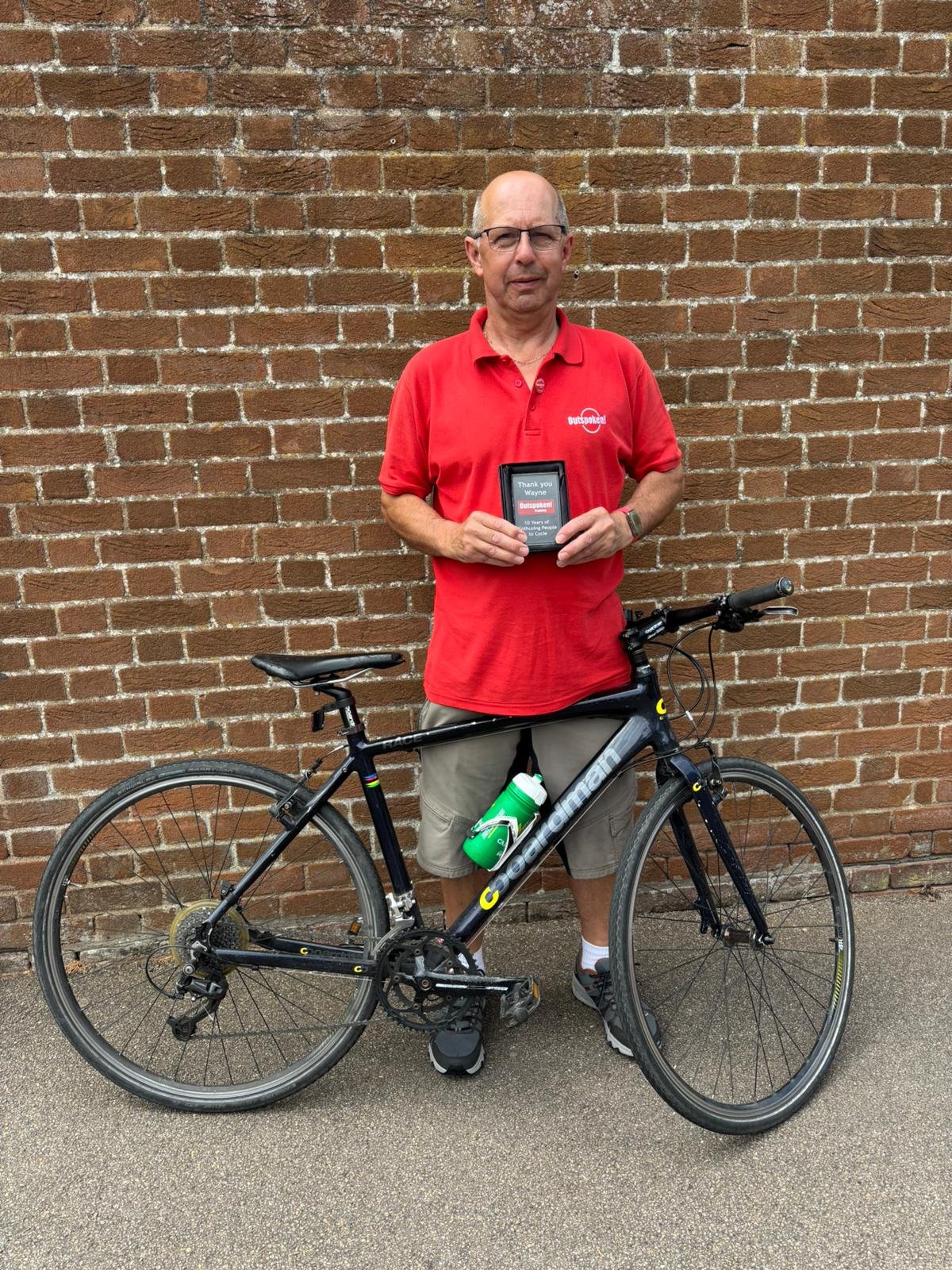 Wayne with his award
